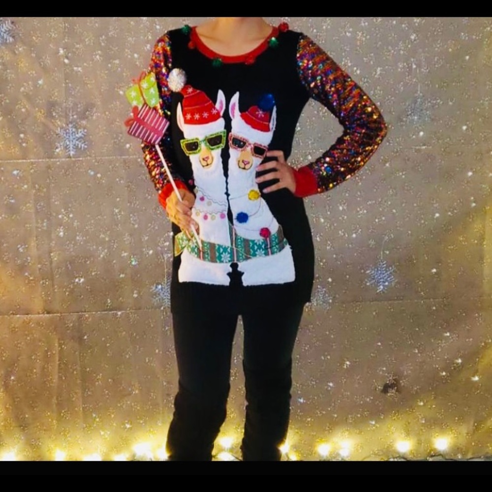 Ugly Christmas Sweater size XS, but fits like a medium.